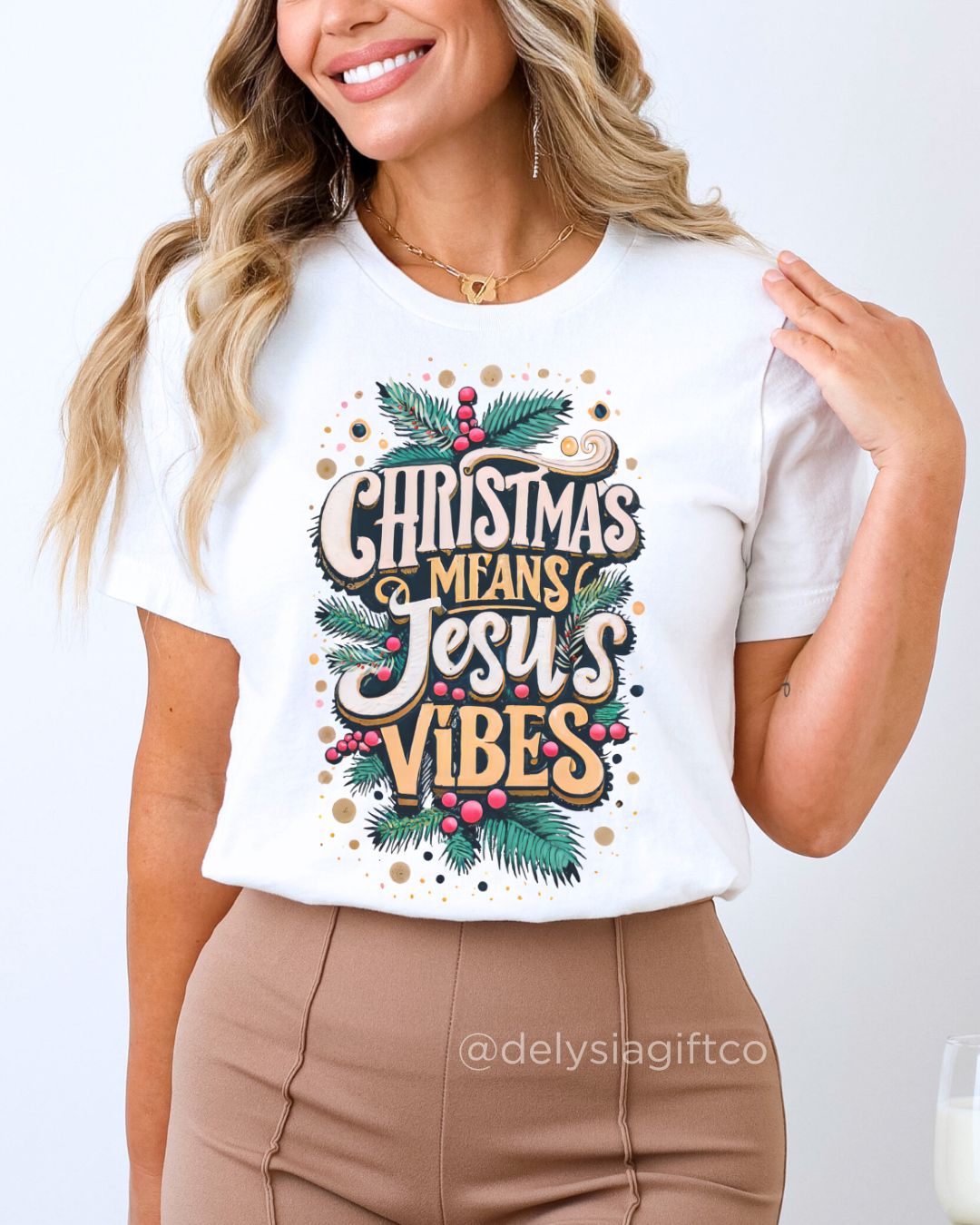 Woman wearing Christmas Means Jesus Vibes Christian T-shirt — faith-based Christmas apparel celebrating Jesus with festive holiday design.