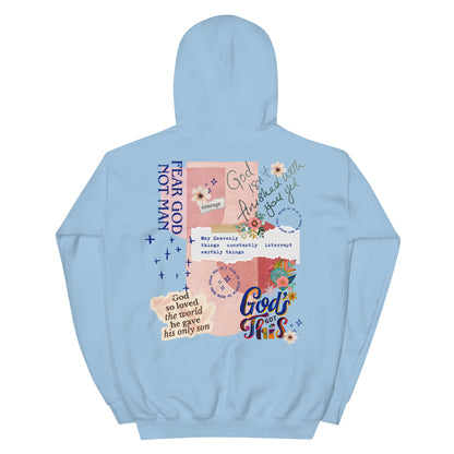 Woman wearing Fear God Not Man hoodie with God Tier collage design — Christian streetwear faith apparel.