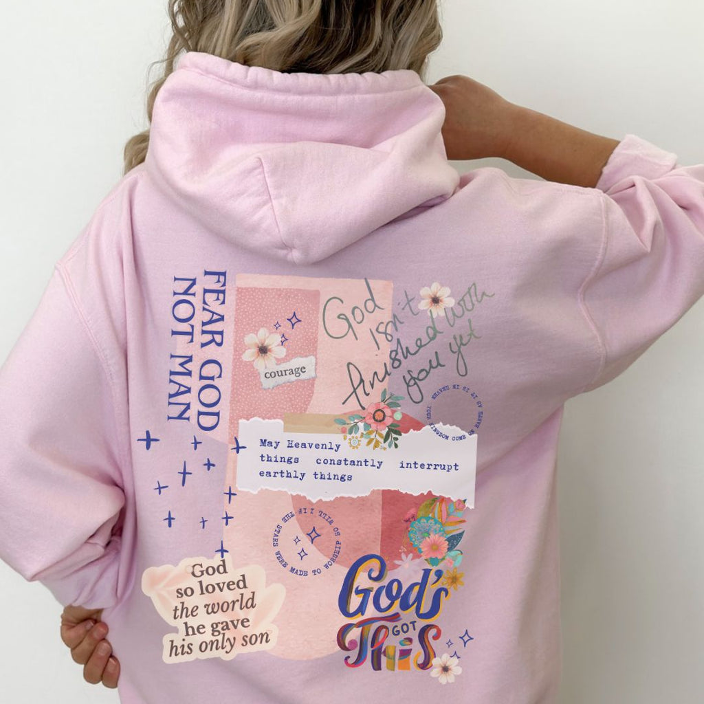 Back view of a pink faith-inspired hoodie with collage-style Christian design