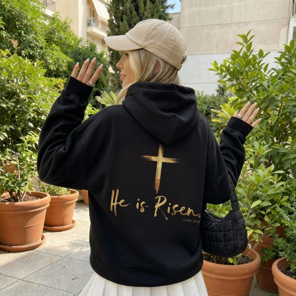 White t-shirt with a cross and floral design on a white background