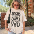 Woman wearing Jesus Loves You Christian t-shirt outdoors