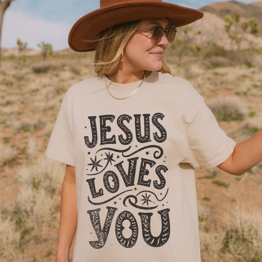 Woman wearing Jesus Loves You Christian t-shirt outdoors