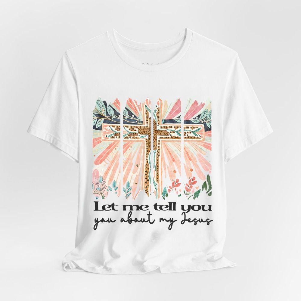 White t-shirt with a cross and floral design on a white background