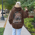 Back view of brown hoodie featuring Lion of Judah artwork with floral details and scripture inspired text