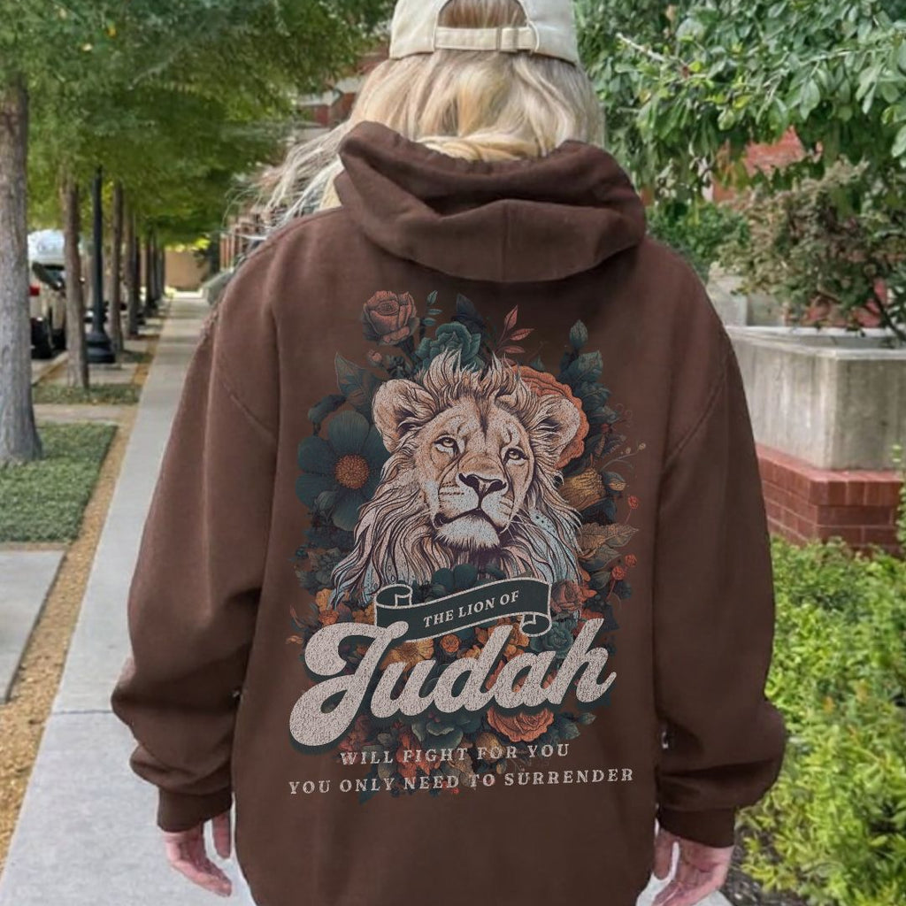 Back view of brown hoodie featuring Lion of Judah artwork with floral details and scripture inspired text