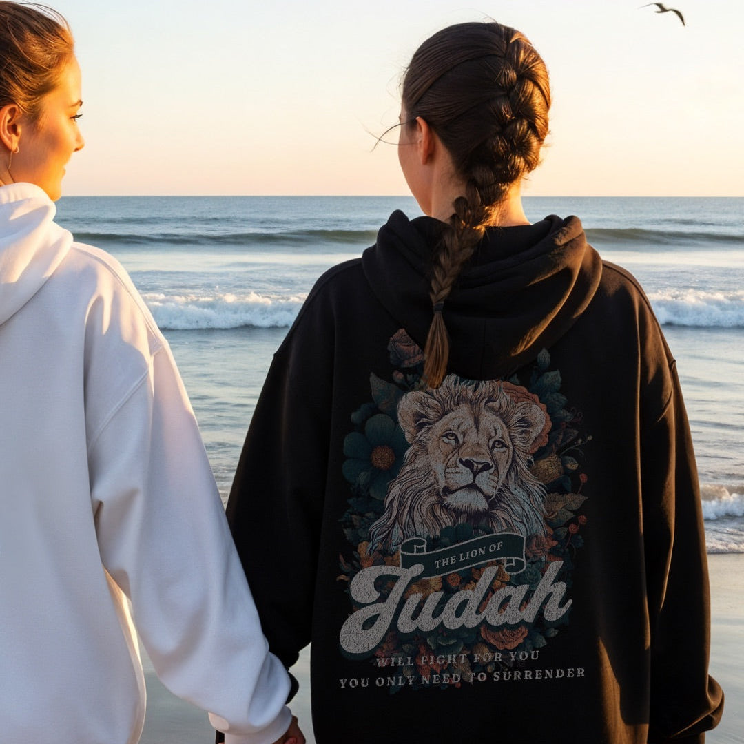 Back view of brown hoodie featuring Lion of Judah artwork with floral details and scripture inspired text