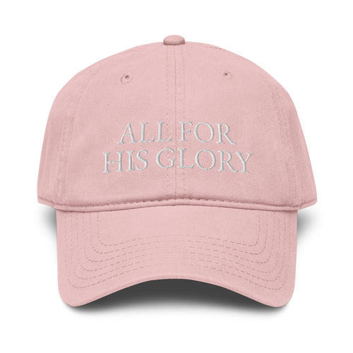 Woman wearing blush pink All for His Glory embroidered Christian baseball cap with gold necklace and neutral sweater.