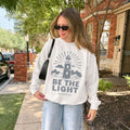Faith sweatshirt with lighthouse and Matthew 5:14 design. Christian sweatshirt encouraging them to be the light