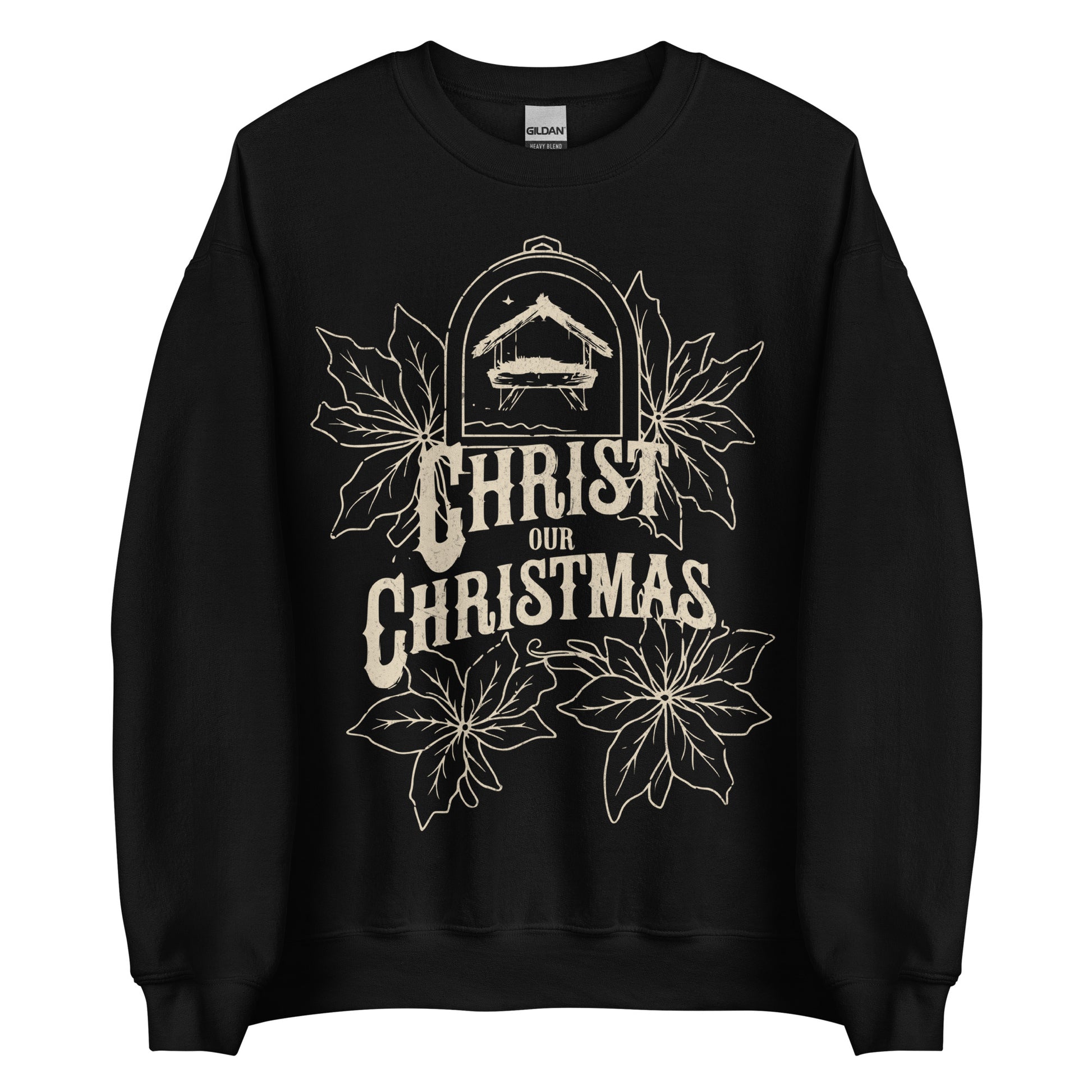 Woman wearing burgundy Christ Our Christmas sweater with manger and poinsettia design.