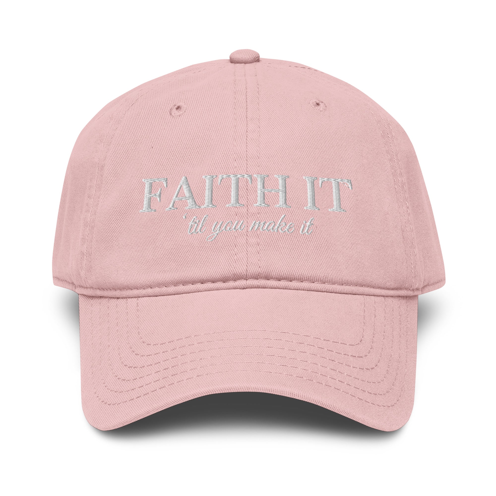 Woman wearing blush Faith It Til You Make It Christian embroidered baseball cap with neutral sweater and gold necklace.