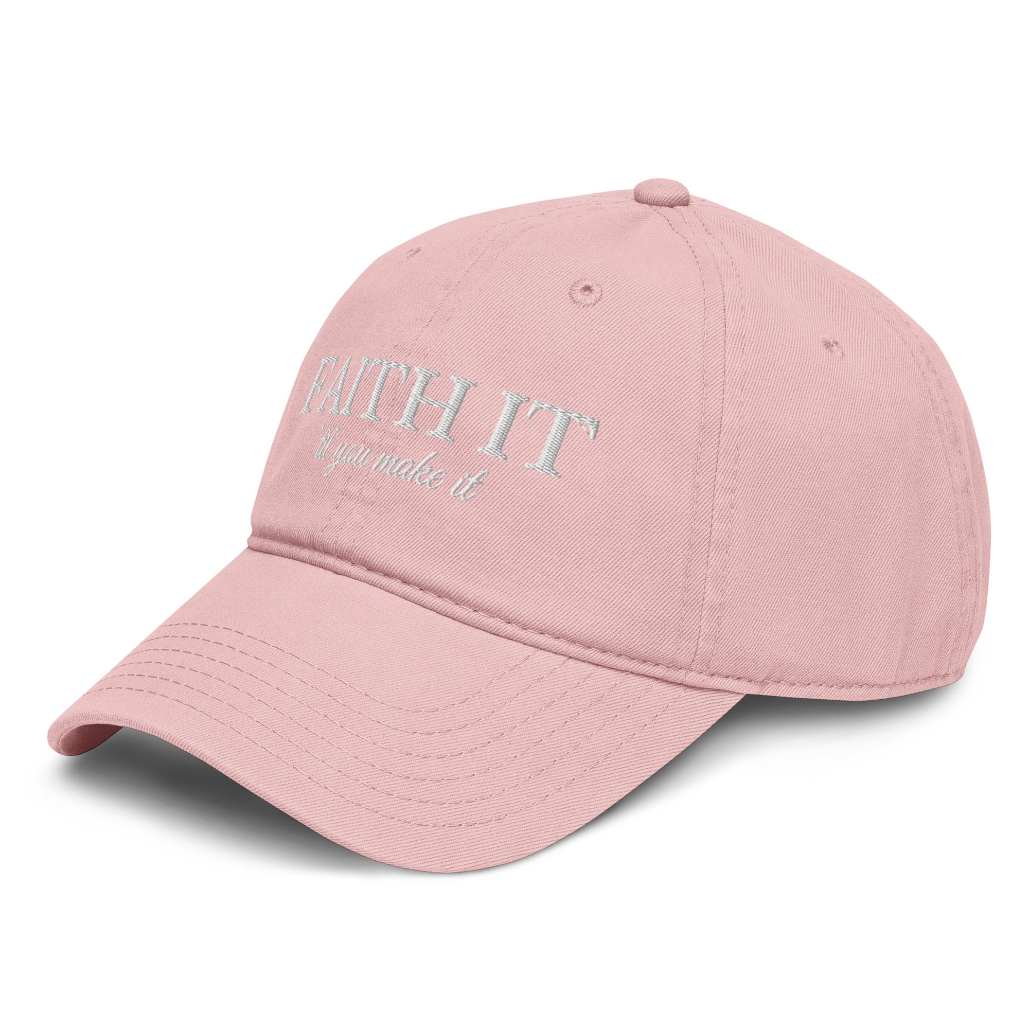 Woman wearing blush Faith It Til You Make It Christian embroidered baseball cap with neutral sweater and gold necklace.
