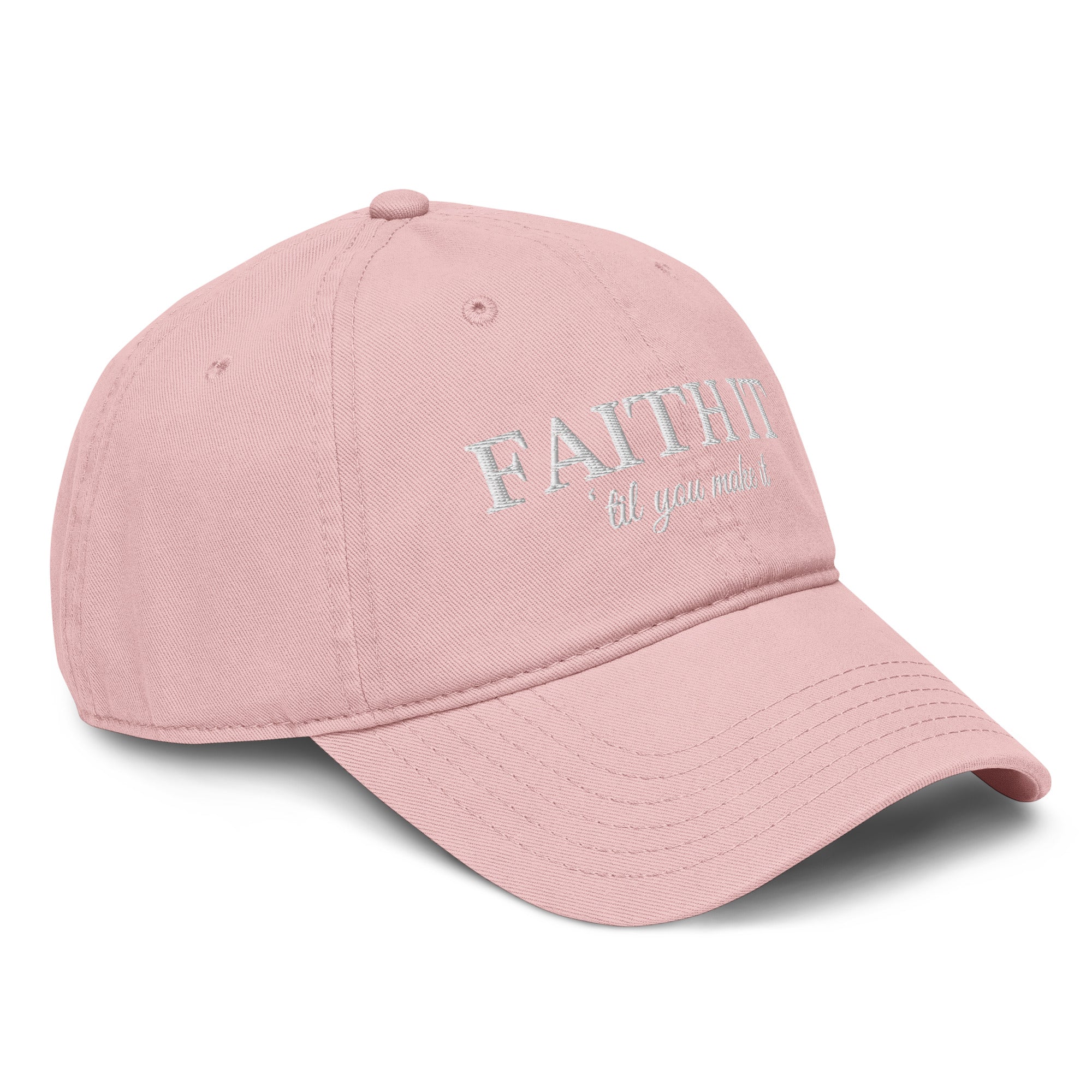 Woman wearing blush Faith It Til You Make It Christian embroidered baseball cap with neutral sweater and gold necklace.