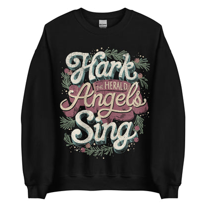 Woman wearing black Hark the Herald Angels Sing Christian Christmas sweater with festive wreath design.