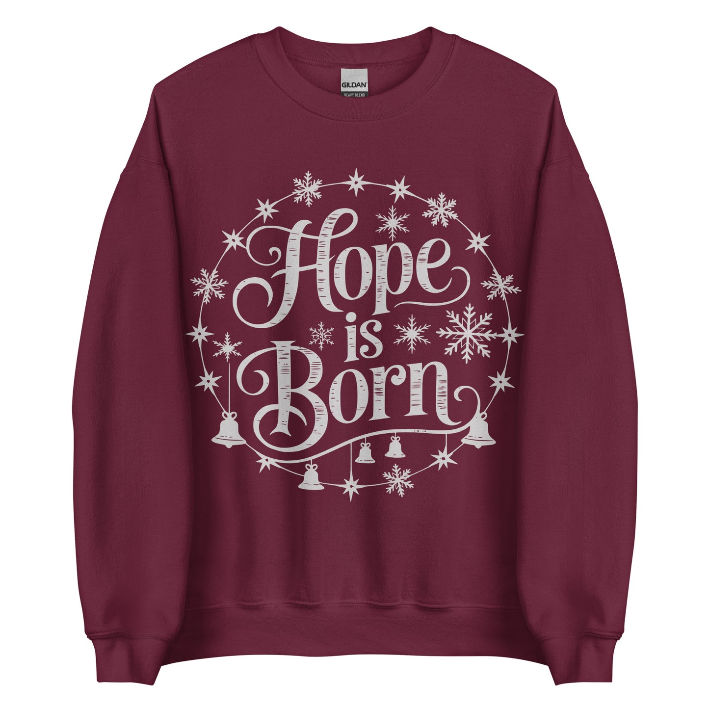Woman wearing burgundy Hope Is Born Christian Christmas sweater with snowflake and star design.