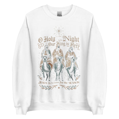 Woman wearing O Holy Night Our King Is Here Christian Christmas sweater featuring the three wise men under the star of Bethlehem.