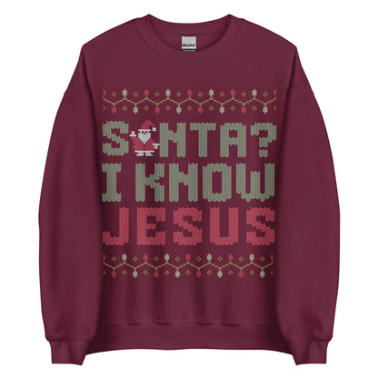 Woman wearing white Christian Christmas sweater with the phrase Santa? I Know Jesus in festive cross-stitch style.
