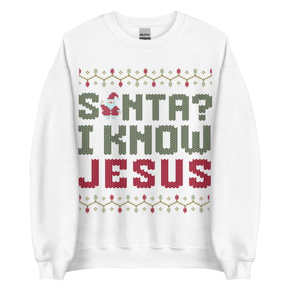 Woman wearing white Christian Christmas sweater with the phrase Santa? I Know Jesus in festive cross-stitch style.