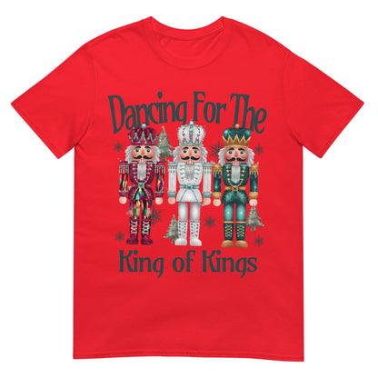 Woman wearing Dancing for the King of Kings Christian Christmas T-shirt with festive nutcracker design — joyful faith apparel celebrating Jesus.