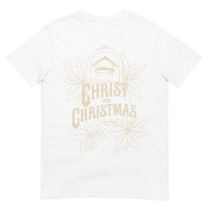 Woman wearing Christ Our Christmas Christian T-shirt with nativity design and poinsettias — faith-based apparel celebrating Jesus this holiday.
