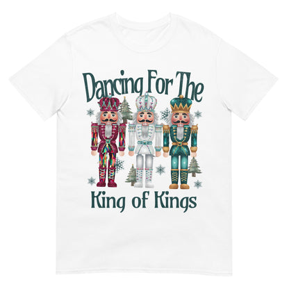 Woman wearing Dancing for the King of Kings Christian Christmas T-shirt with festive nutcracker design — joyful faith apparel celebrating Jesus.