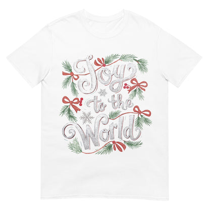 Woman wearing Joy to the World Christian Christmas T-shirt — festive faith-based design with greenery and red bows.