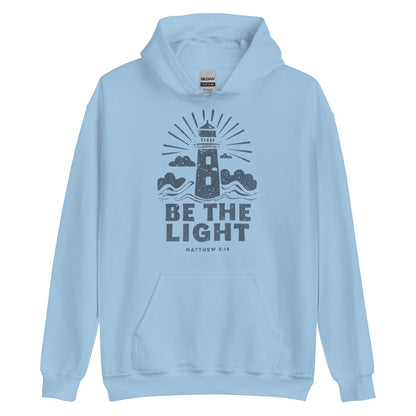 Faith hoodie with lighthouse design and Matthew 5:14 scripture. Christian hoodie for women reminding believers to shine their light.